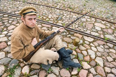 Soldier with boiler and gun in retro style picture