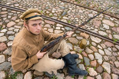 Soldier with boiler and gun in retro style picture