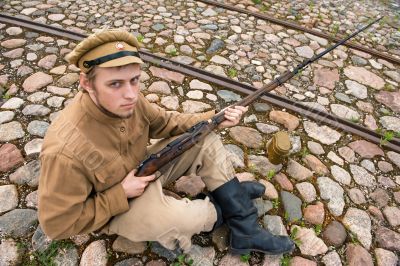 Soldier with boiler and gun in retro style picture