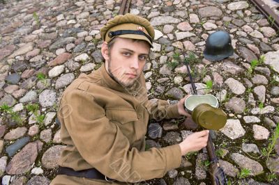 Soldier with boiler and gun in retro style picture