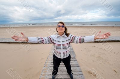 Adult woman at the sea