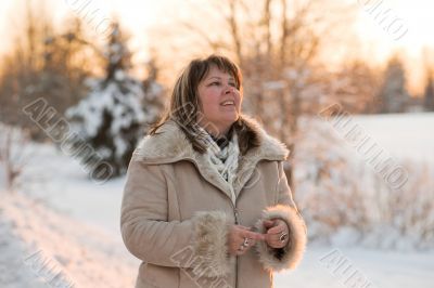 Woman on winters sunset Woman on winters sunset