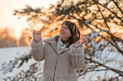 Woman on winters sunset Woman on winters sunset