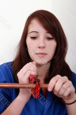 portrait of a young woman plumbing