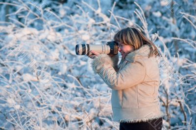 Woman with photo camera