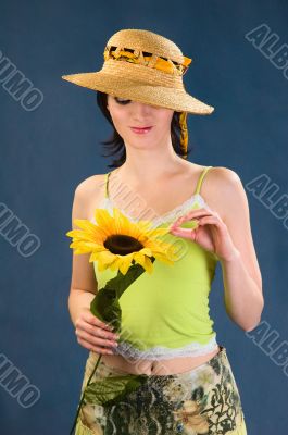 Beautiful  woman with sunflowers