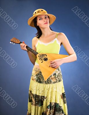 pretty woman with  a stringed instrument