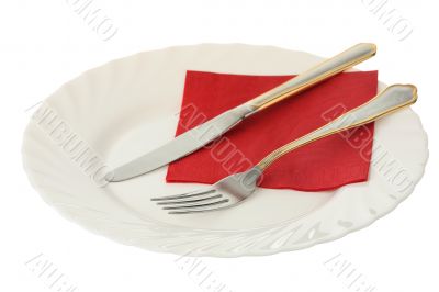 Fork and knife on a plate