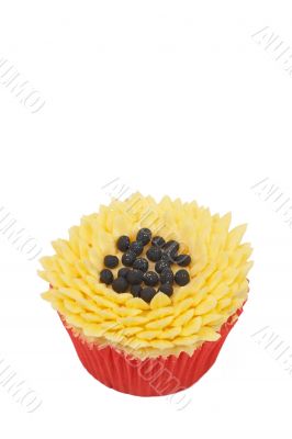 Vanilla cupcake with sunflower decoration