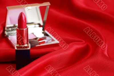 Cosmetics On Red Silk