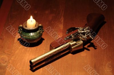 Ancient Pistol And Candle