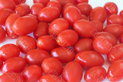 Baby rosa tomatoes on white