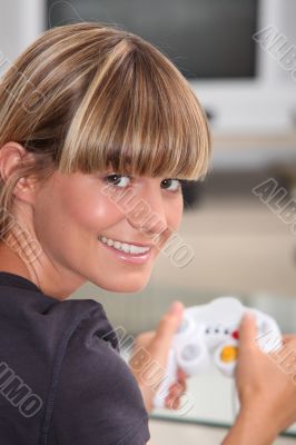 Young woman playing a video game