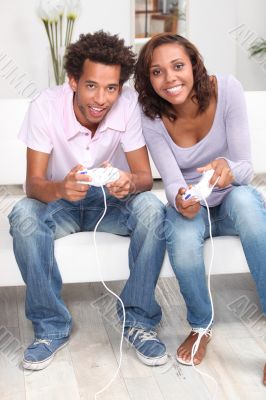Couple playing computer games Couple playing computer games