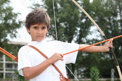 Boy with a bow and arrow