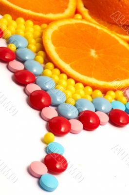 The different color vitamins with orange DOF