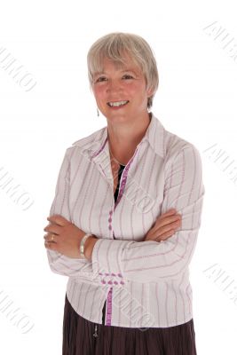 Smiling Senior Businesswoman with Arms Folded