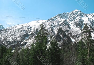 Caucasus mountains under the snow and clear sky