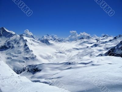 Caucasus mountains under the snow and clear sky