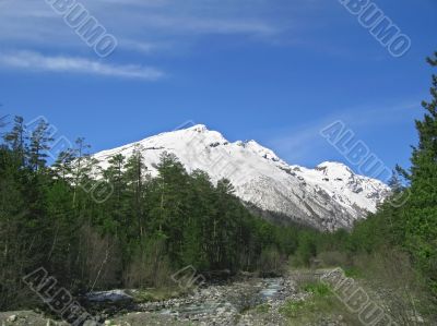 Caucasus mountains under the snow and clear sky