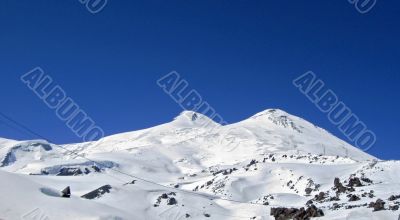 Caucasus mountains under the snow and clear sky