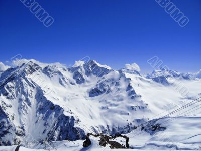 Caucasus mountains under the snow and clear sky