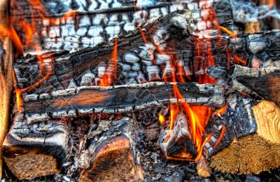 Closeup of a warm fire burning in a fireplace