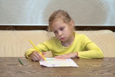 Girl has thought of drawing.