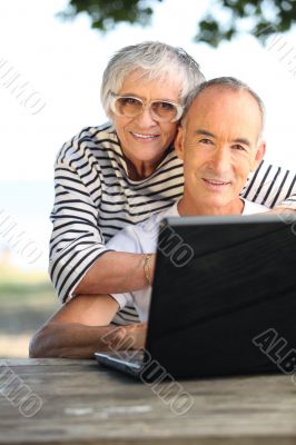 Retired couple on the computer