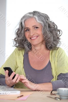 Older woman using a cellphone