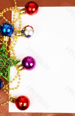 Colorful Christmas baubles and card