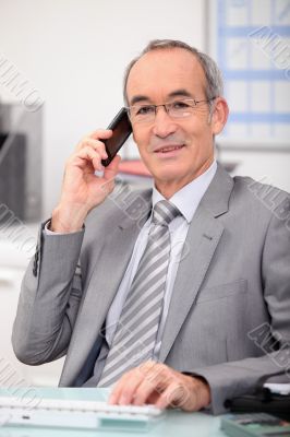 senior businessman on the phone