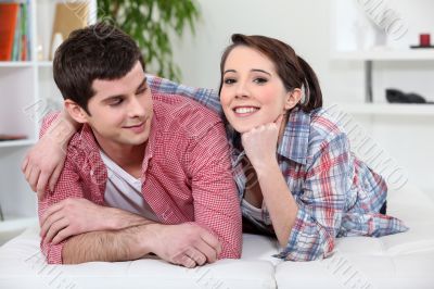 young couple relaxing on the couch