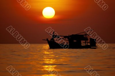 ship and sunset