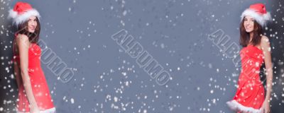 Portrait of two young twins women standing against each other