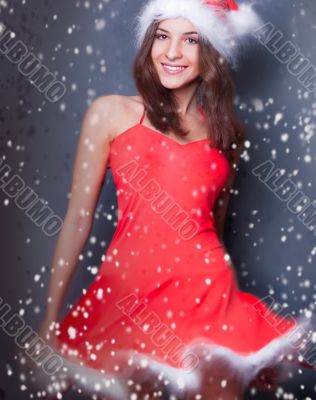 Portrait of beautiful young christmas woman posing.