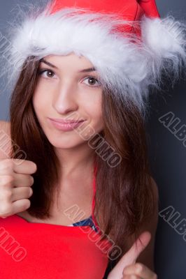 20-25 years od beautiful woman in christmas dress. Closeup to he