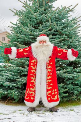 Full Length Portrait of Santa Claus standing with open hands out