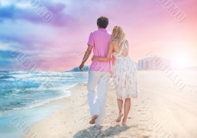 Idealistic poster for advertisement. Couple at the beach holding