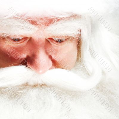 Santa Claus portrait smiling isolated over a white background