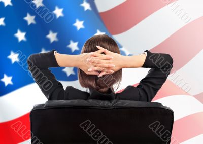 Closeup portrait of cute young business woman from behind sittin