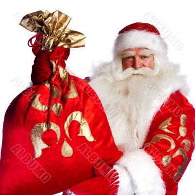Santa Claus standing up on white background with his bag full of