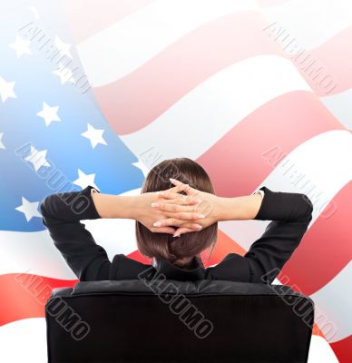 Closeup portrait of cute young business woman from behind sittin