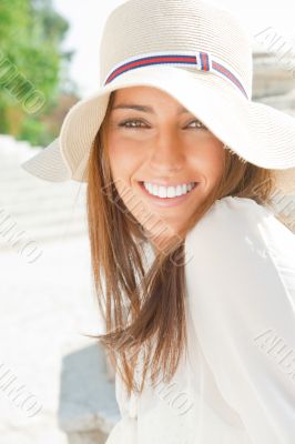 Closeup portrait of a beautiful young woman having a happy thoug