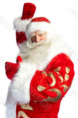 Santa Claus pointing his hand isolated over white.