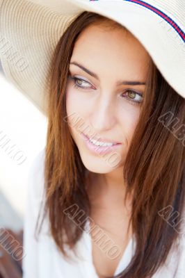 Beautiful young elegant woman wearing hat outdoor at park she is