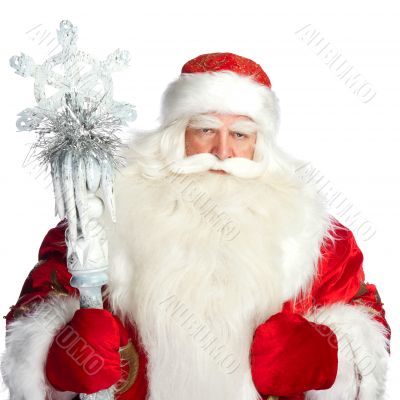 A traditional Christmas Santa Clause with staff isolated on whit