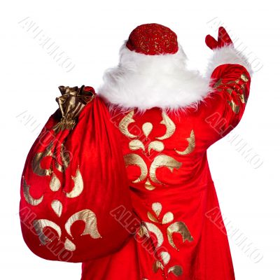 Santa Claus standing up on white background with his bag full of