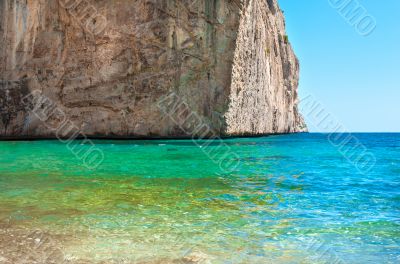 Bright view of calm wild beach of spanish coast line. Clean Medi