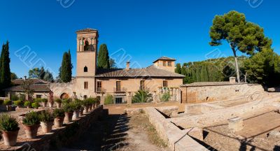 Alhambra de Granada. Convento de San Francisco behind a pond